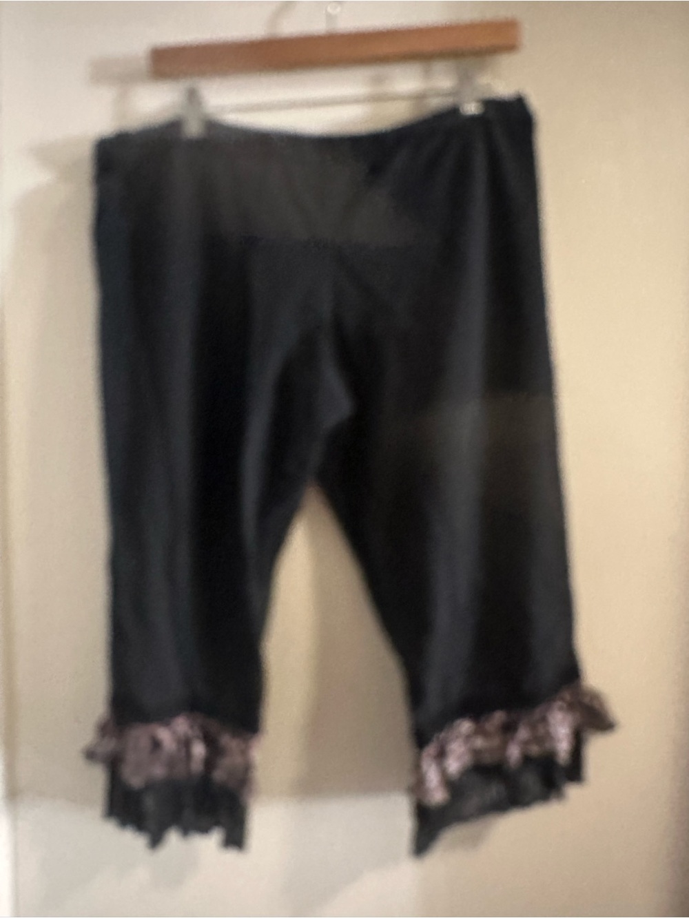 Black Crop Pants with Ruffled Floral Trim